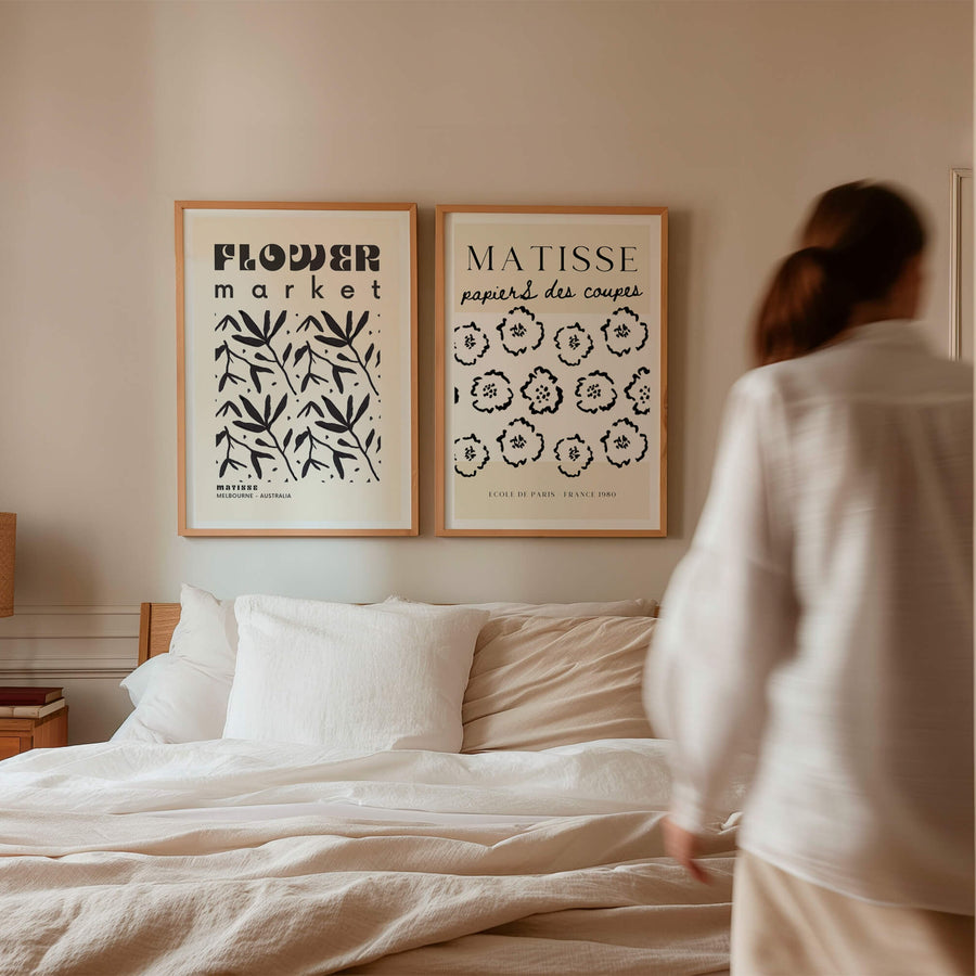 Matisse-inspired black and white Flower Market Melbourne print featuring hand-drawn botanical elements on a neutral beige background. A minimalist yet bold wall art piece. Get 2PrintsFor$100 that comes with Free Shipping 🚚💫 in Australia.