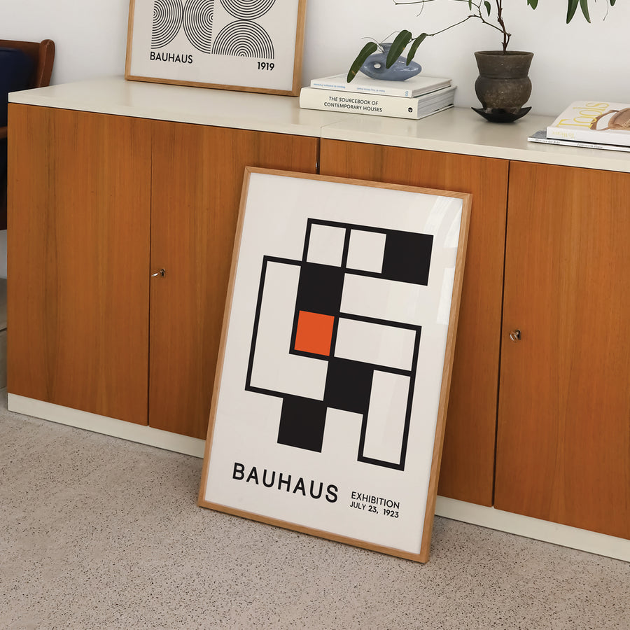 Geometric Bauhaus-inspired art print featuring a dynamic matrix of shapes, bold lines, and vibrant colors. Perfect for contemporary home decor, adding a minimalist yet striking visual element to modern interiors.