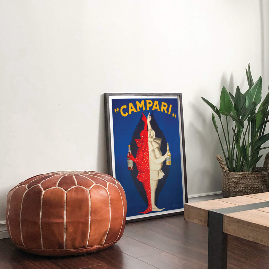 Campari print by Leonetto Cappiello in classic Art Nouveau style, featuring vibrant red tones, bold typography, and vintage advertising charm. Perfect for retro decor enthusiasts.