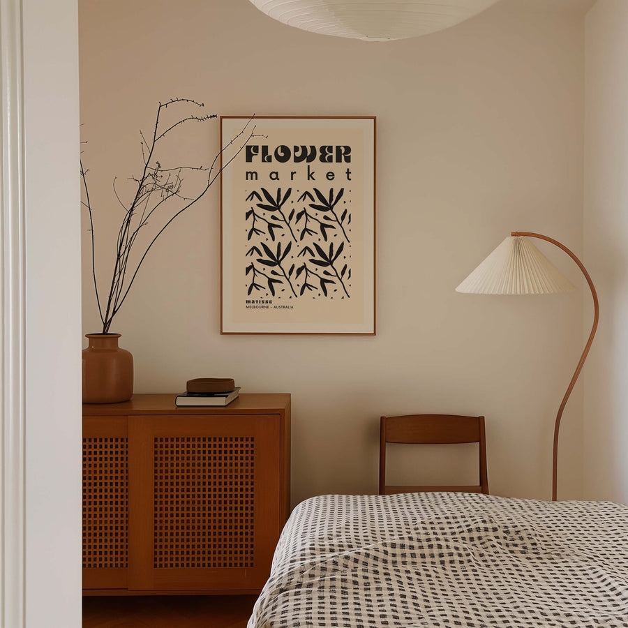 Matisse-inspired black and white Flower Market Melbourne print featuring hand-drawn botanical elements on a neutral beige background. A minimalist yet bold wall art piece. Get 2PrintsFor$100 that comes with Free Shipping 🚚💫 in Australia.