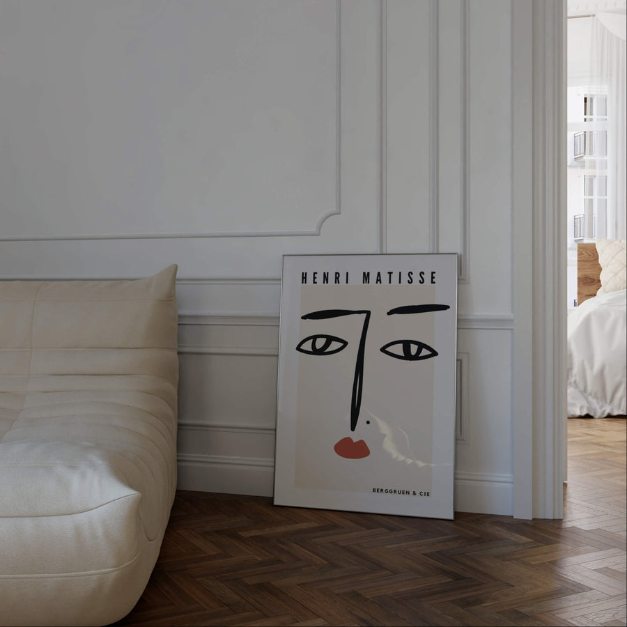 Matisse-inspired minimalist face line art print featuring bold black strokes and terracotta lips on a neutral background. A modern and elegant wall art piece. Get 2PrintsFor$100 that comes with Free Shipping 🚚💫 in Australia.