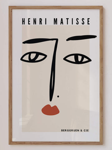 Matisse-inspired minimalist face line art print featuring bold black strokes and terracotta lips on a neutral background. A modern and elegant wall art piece. Get 2PrintsFor$100 that comes with Free Shipping 🚚💫 in Australia.