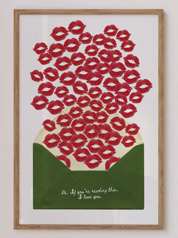 A romantic art print featuring a green envelope with red lipstick kiss marks spilling out. The handwritten text reads: 